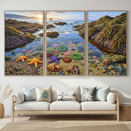 A modern living room with a white couch, large triptych artwork of ocean scene with starfish, sea creatures, and rocky shorelineの写真素材