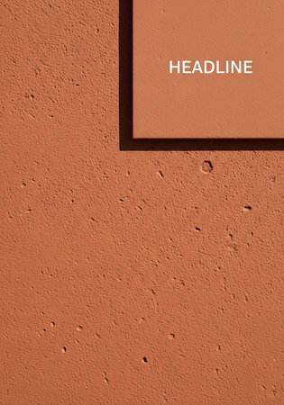 A close-up view of a textured orange surface with a headline placeholderの写真素材