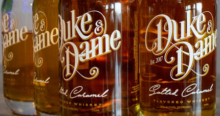 Miami, FL/USA. November 14,2018. Closeup shot of bottles of Duke & Dame Salted Caramel Whiskey.のeditorial素材