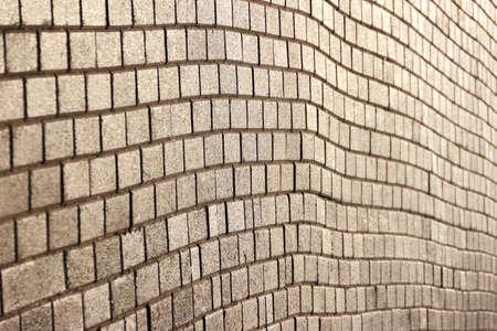 Old retro quare brick wall to the perspective like background for design