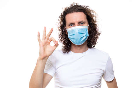 Man in medical mask. Pandemic coronavirus epidemic covid-19 quarantine isolated whiteの写真素材