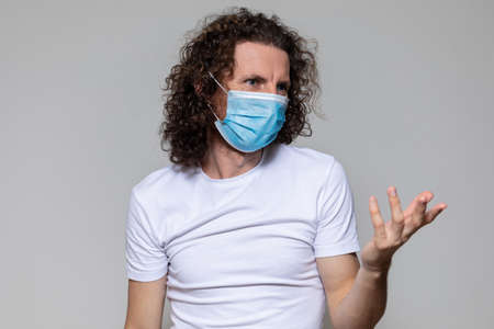 Man in medical mask. Pandemic coronavirus epidemic covid-19 quarantineの写真素材