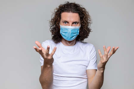 Man in medical mask. Pandemic coronavirus epidemic covid-19 quarantineの写真素材