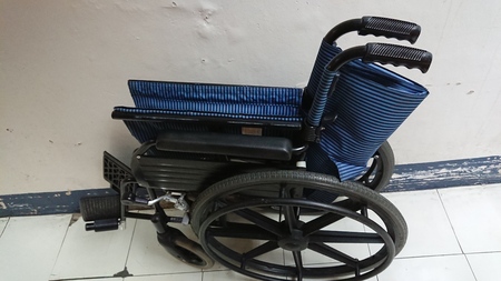 Wheelchairs parked inside the hospital.の写真素材