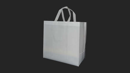 Beautiful Non Woven grocery shopping bag with black background. Copy space for text and logoの写真素材