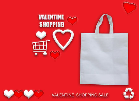 Valentine's gift ECO bags. Happy Valentines Day Shopping Bags Sale Banner with heart and shopping basket. copy space for text.の写真素材