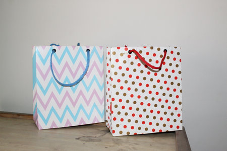 colorful paper shopping bags. Set of Colorful Empty Bags for Mockup. Composition of space for branding. close up view bagsの写真素材