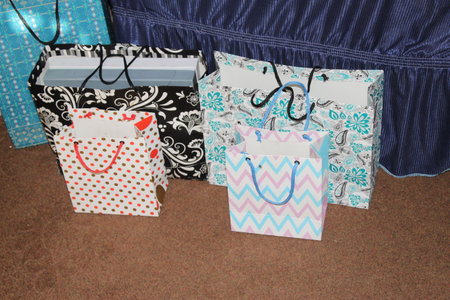 few different paper shopping bags. Set of Colorful Empty Bags for Mockup. Composition of space for branding. close up view bagsの写真素材