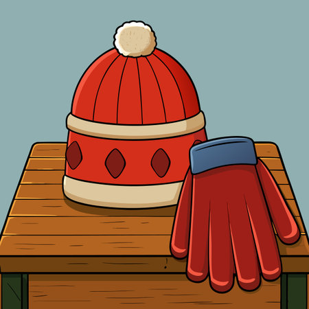 Winter hat and gloves on wooden table. Vector illustration in cartoon style.のイラスト素材