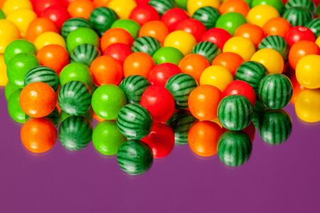 Colorful bubble gum spilling. Macro with shallow dof. Selective focus.の写真素材