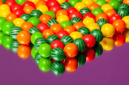 Colorful bubble gum spilling. Macro with shallow dof. Selective focus.の写真素材