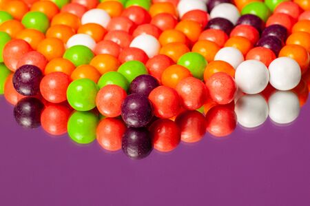Colorful bubble gum spilling. Macro with shallow dof. Selective focus.の写真素材