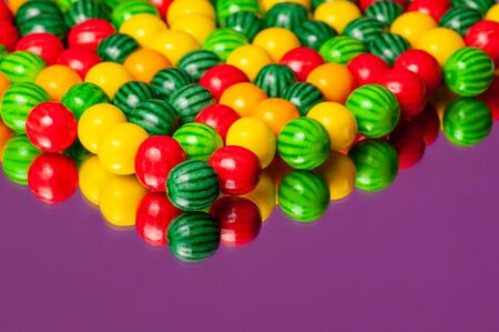 Colorful bubble gum spilling. Macro with shallow dof. Selective focus.の写真素材
