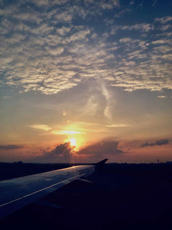 Sunset by the wing. の素材