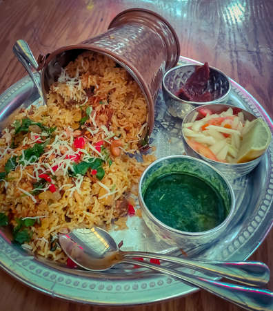 Close view of Indian traditional dish shahi biriyani in traditional bowlの写真素材