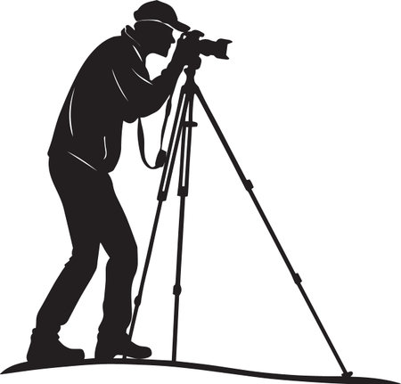 Black and white vector silhouette of a photographer with hat looking through camera on tripod in...