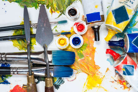 Seating area of artist, painting with oils, brushes and palette knife. Art workshop, the concept of creativity and art therapy.の写真素材