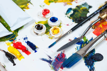 Seating area of artist, painting with oils, brushes and palette knife. Art workshop, the concept of creativity and art therapy.の写真素材