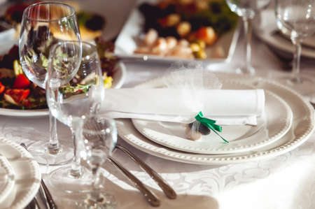 Empty glasses set on the table in restaurantの写真素材
