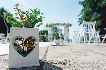 Retro wedding ceremony outdoors. wedding arch. love sunny dayの写真素材