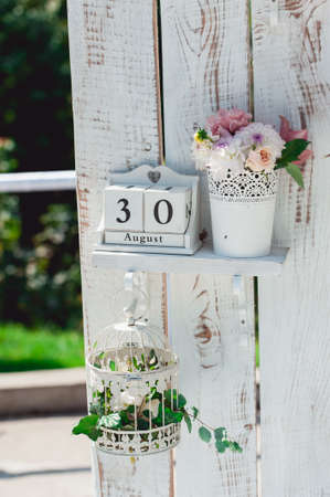 date of August 30 is composed of vintage pieces. on white wooden decorationsの写真素材