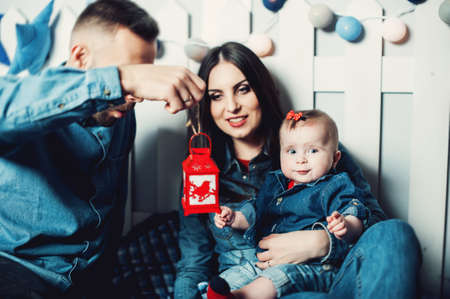 parents whith their babyの写真素材