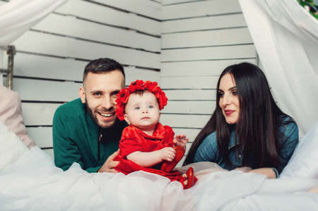 parents whith their babyの写真素材