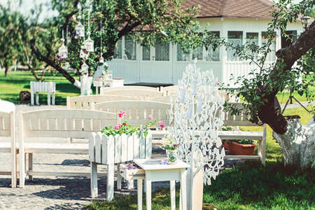 beautiful vintage wedding ceremony outdoors. Summertime. Old whiの写真素材