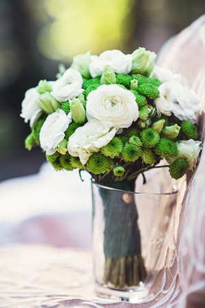 wedding bouquet of white green flowersの写真素材
