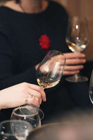 people consider the color of the wine and try how it smells in different glasses