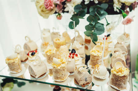 Macaroons, Biscuits, sweet baskets, On a glass stand with other bakeryの写真素材