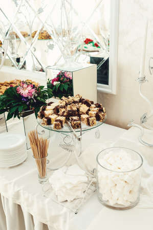 Color zephyrs in glass jar. Wedding candy barの写真素材