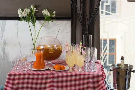 Fresh juice on a table in a restaurant. Healthy drinks. carrot fresh in a jarの写真素材