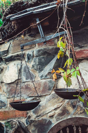 vintage medical weight in old abandoned yardの写真素材