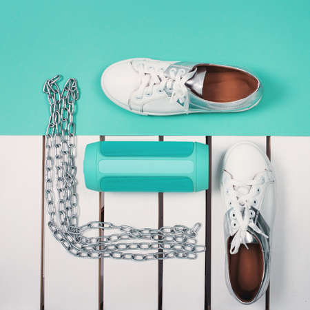 Flat Lay of Modern White Shoes. Overhead Top View Photography. Youth Lifestyle Concept. Turquoise...
