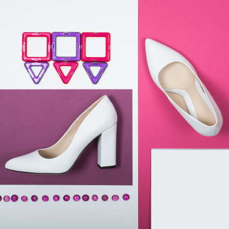 Shoes fashion. Stylish Trendy white heels on a pink background. Summer fashion Outfit, Luxury Party shoes. Minimal fashion concept.の写真素材
