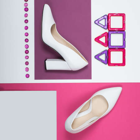 Stylish Trendy white heels . Summer fashion Outfit, Luxury Party shoes. Hipster Essentials. Minimal fashion conceptの写真素材
