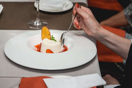 sweet mini dessert with strawberry on a plate in the expensive restaurant. close viewの写真素材