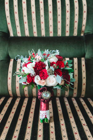 luxurious wedding bouquet made of roses and carnationの写真素材