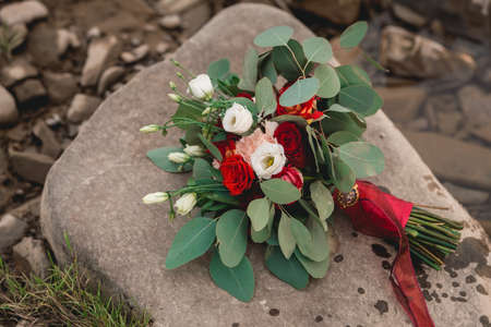 wedding bouquet on a stoneの写真素材