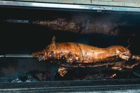 A pig on a grill. traditional coal and fireの写真素材