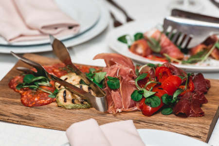 dish with chopped sausageの写真素材