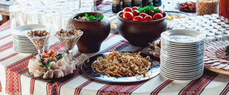 Hearty lard with garlic served with fresh bread on a table.の写真素材