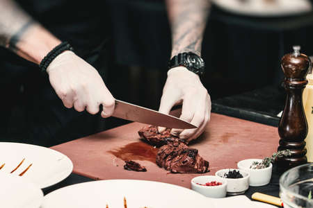 hands of chef making healthy fresh fajitas or fajitos with beef. Easy, but tasty, healthy. National Mexican food, fresh oganic food.の写真素材