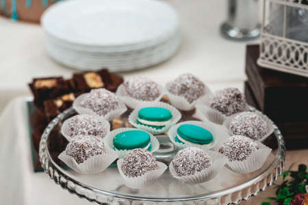 blue birthday macaron on a glass standの写真素材