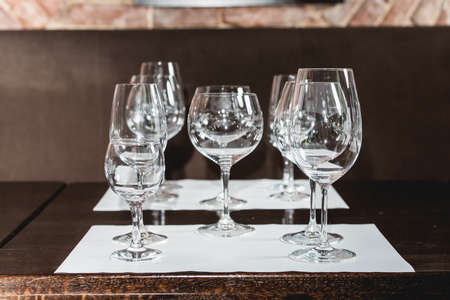 empty glasses of different shapes served for a wine tasting