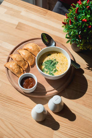A delicious chicken cream soup from chefの写真素材