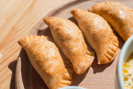 A delicious empanadas with chicken meat, typical dish of Argentinean cuisineの写真素材