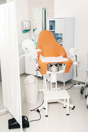 Room in the clinic with empty gynecological chair.の写真素材