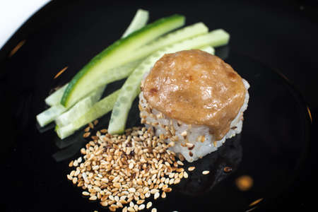 Japanese sushi rolls on a black plate. close view.の写真素材